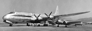 To get an idea of the size of the RV6, note the people standing alongside, and the Lockheed Electra parked under the wing.